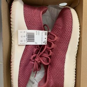 Pink Addis’s sneakers; Tubular Shadow CK W
